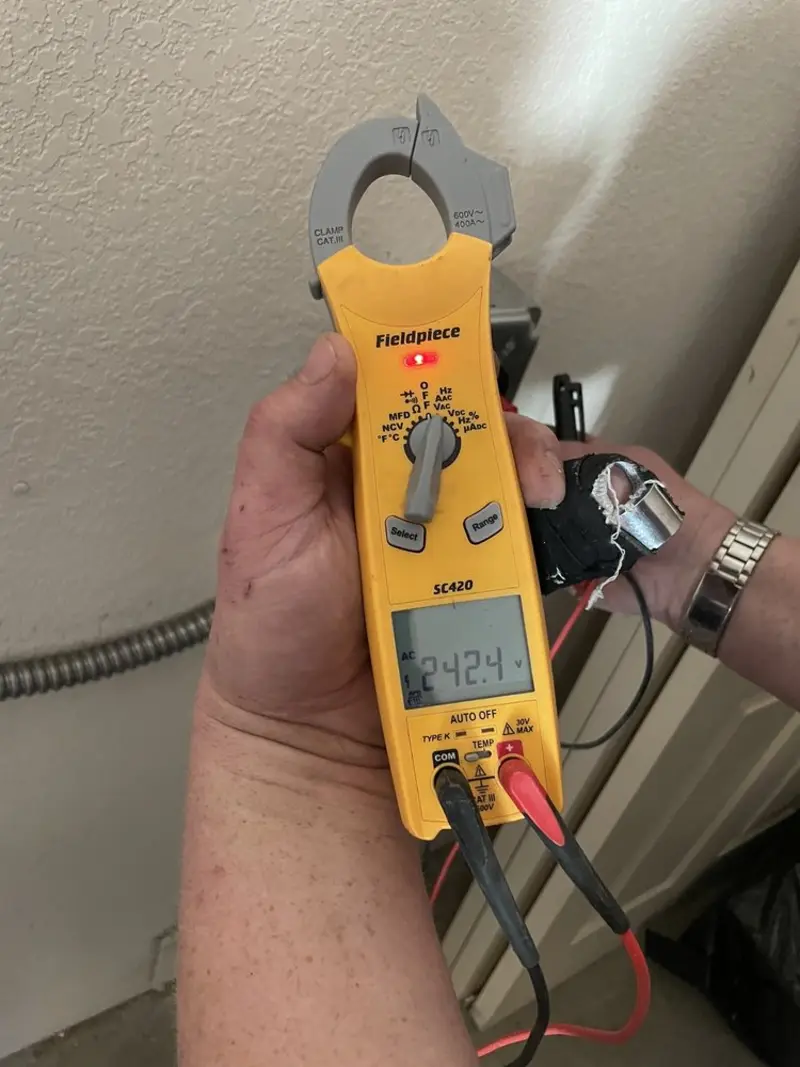 Voltage testing with clamp meter during Hot Tub / Pool Electrical Wiring in Hometown